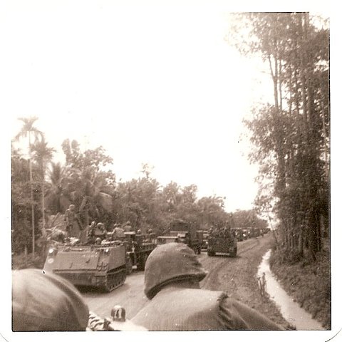 A Co. going out as another company escorts a convoy in